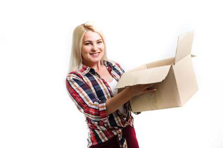 picture of attractive businesswoman delivering cardboard box