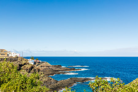 Aerial view of Garachico village on the coast of Atlantic ocean in Tenerife island of Spainの写真素材