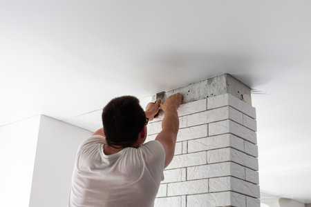 Installation of stretch ceiling. Niche for stretch ceiling. Stretch ceiling, work.の写真素材