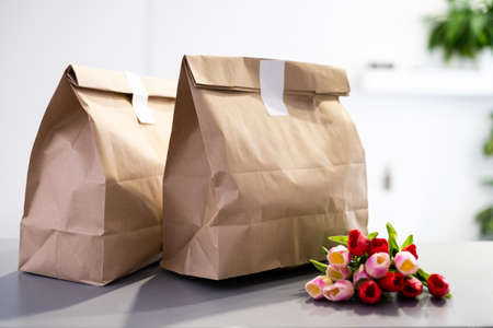food delivery packages and tulipsの写真素材