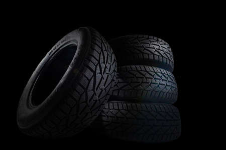Car tire on black backgroundの写真素材
