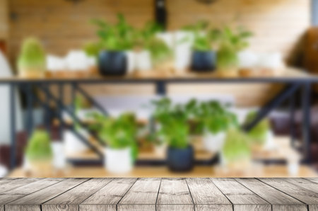 Wooden table and blur restaurant background
