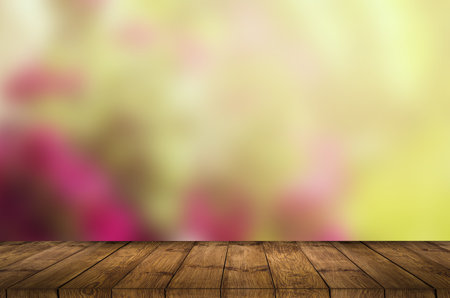 Empty top wooden table and flower blurred background. Can use for product display