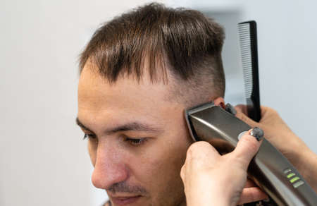 Mans hairstyle by means of the special machine hairstyleの写真素材