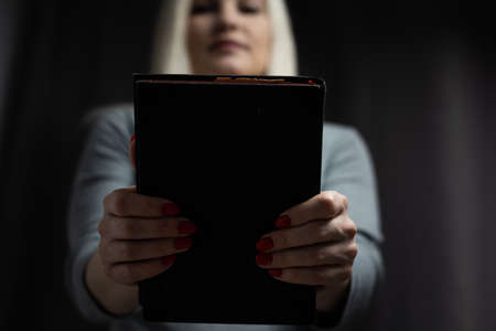Woman reading the Holy Bible, Reading a bookの写真素材