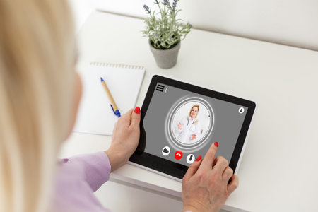 Headshot portrait application screen view of female doctor or talk consult client online on...