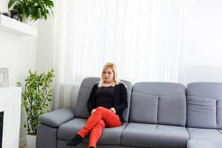 Tired troubled woman talkign with her psychologist.の写真素材