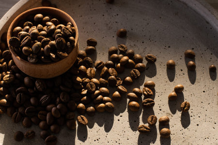 Coffee beans in a wooden cup