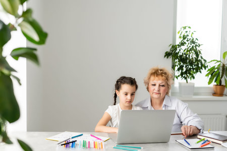 Children and education, teacher or grandmother teaching with notebook by internet to girl
