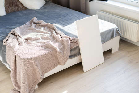 white photo canvas stands in the roomの写真素材