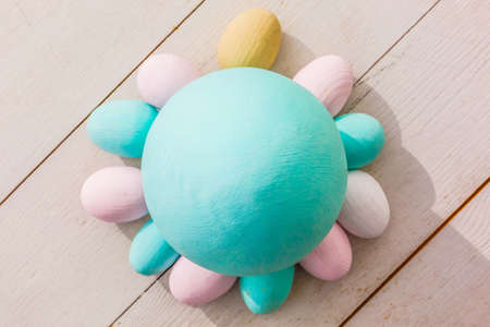 Colored easter eggs on blue backgroundの写真素材