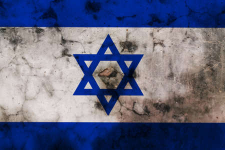 Israel flag on old wall. Patriotic grunge background. National flag of Israelの写真素材