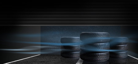 Car tires in front of a garage