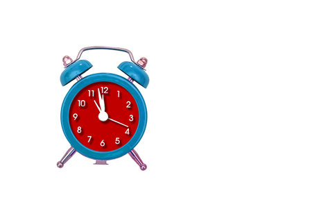 red old style alarm clock isolated on white