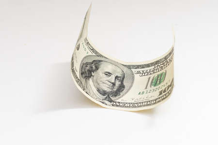bill one hundred dollars on a white backgroundの写真素材