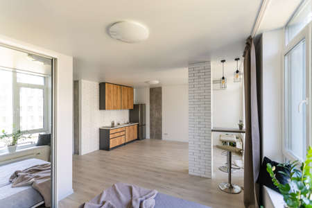 Kitchen and living room of loft apartmentの写真素材