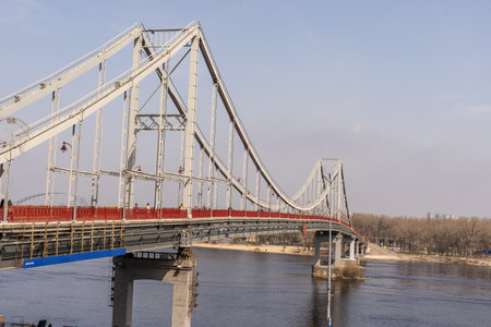 Kyiv, Ukraine- April 1, 2021: Pedestrian Bridge on Trukhanov Island. Walking along the pedestrian zone of the old city.のeditorial素材
