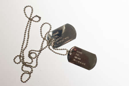 Identification badges on a chain, army badge.の写真素材