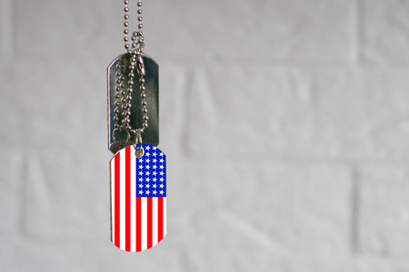 Army tokens on American national flag background