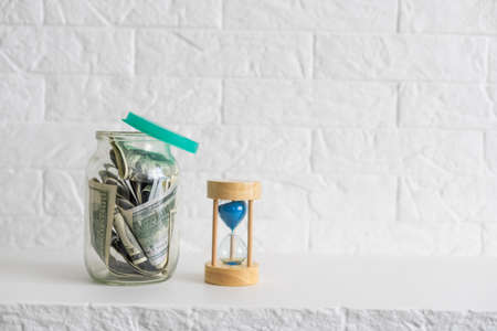 dollars in the bank and hourglassの写真素材