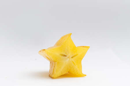 star fruit carambola or star apple starfruit on white background healthy star fruit food isolatedの写真素材
