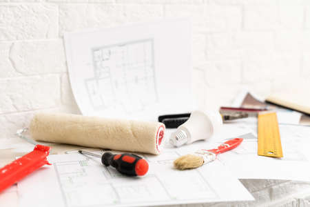 Decorator table with painting project and tools. Elevated view. Horizontal composition.の写真素材