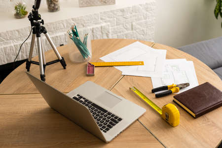 Tools and papers with sketches on the tableの写真素材