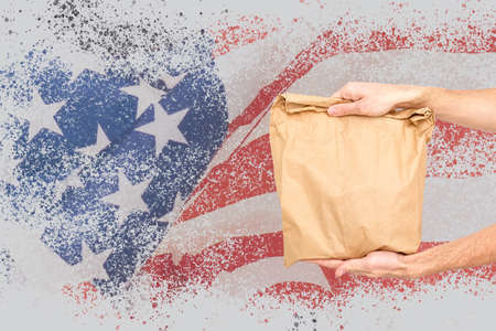 Delivery packaging brown box with america flag, illustration.の写真素材