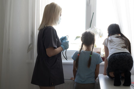 Little girl at the doctors - pediatric checkup
