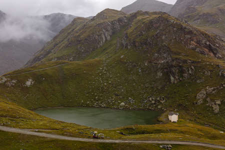 Panorama of cloud layer from mountain top over Swiss alpsの写真素材