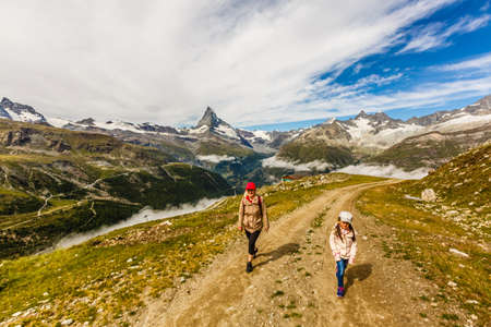 Family trekking, mother and daughter campingの写真素材