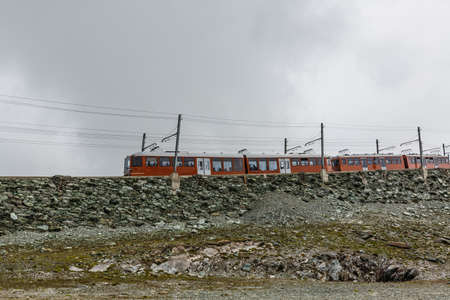 Zermatt, Switzerland -The train of Gonergratbahn running to the Gornergrat station in the famous touristic placeの写真素材