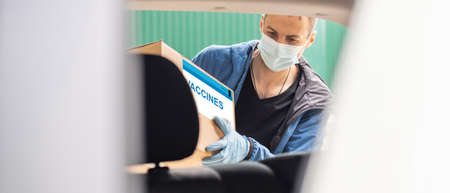 Close up of paper boxes with  virus vaccine, copy space, world pandemic, quarantine,の写真素材