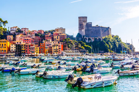Fishing Boats in Liguria Italy. Small fishing boats with fishing equipment docked in the port - Lerici, La Spezia, Liguria, Italyの写真素材