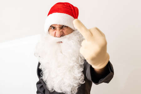 santa laughs and shows a finger on a white backgroundの写真素材