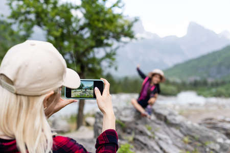 Traveling mother and daughter in the mountains of albaniaの写真素材