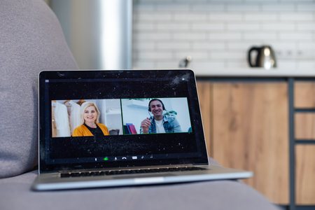 Video call business people meeting on virtual workplace or remote office. Telework conference call using smart video technology to communicate colleague in professional corporate businessの写真素材
