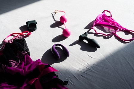 Variety of colorful sex toys for adults laptop