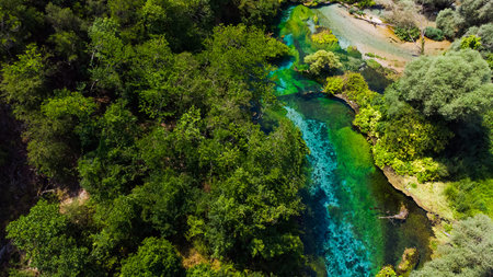 Beautiful turquoise spring Blue Eye, Albania. The spring is very powerful, cold and deep and is a...