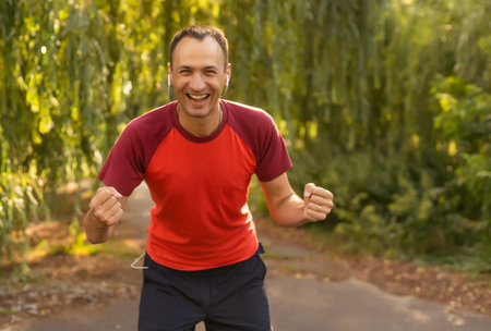 happy man in a park. Healthy lifestyle concept