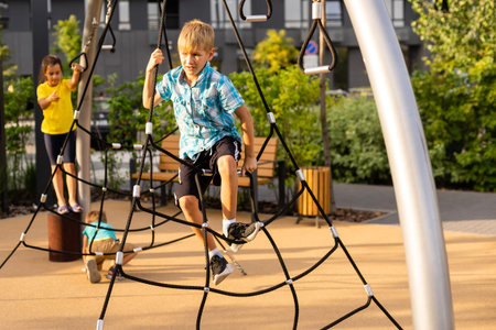 Image of joyful friends having fun on playground outdoors