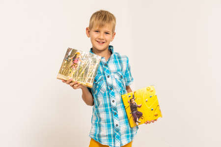 boy holding photo canvas on white background.の写真素材
