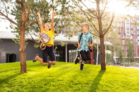 Elementary school kids having fun outdoorsの写真素材