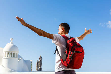 Hiker travel lifestyle young man with backpack, traveling aloneの写真素材