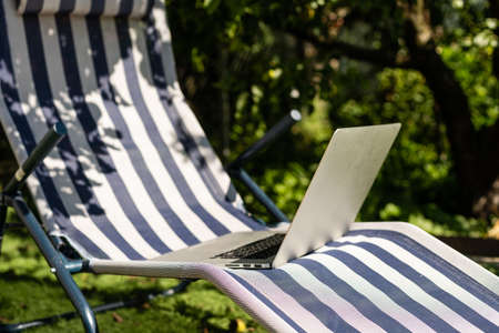 Laptop on the garden, close-up.の写真素材