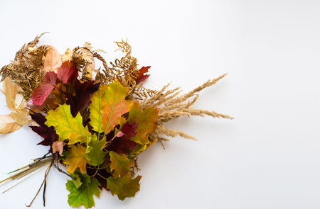 Autumn bouquet from leaves in a gift to the sentimental person. bouquet of autumn leaves