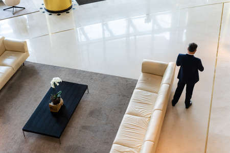 hall of a large light office with furniture.の写真素材