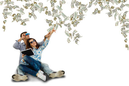 Photo of optimistic nice couple win money isolated on white color backgroundの写真素材