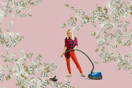 pretty woman throwing dollar bills, isolated on white backgroundの写真素材