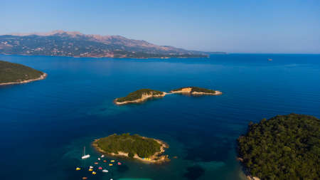 Typical Albanian landscape on the Adriatic shore with mountains. Sunny morning in Albania, Europe. Traveling concept background.の写真素材